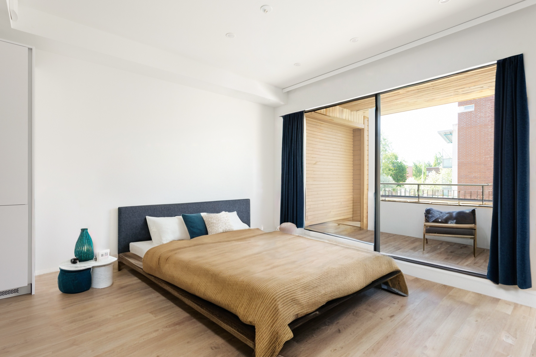 A bedroom generated into the empty living room, with the real walls, floor and balcony kept intact.